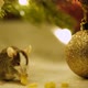 Macro Shot of A Small Gray Rat Eating Cheese Sitting Among the Decorations Under the Christmas Tree. - VideoHive Item for Sale