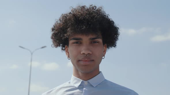 Portrait Millennial African American on Sky Background