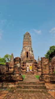 Ayutthaya Thailand at Wat Ratchaburana Couple Men and Women with a Hat Visiting Ayyuthaya Thailand