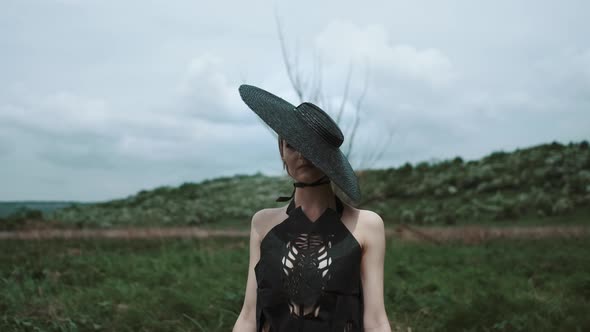 Portrait Of Pretty Blonde In Black Hat.