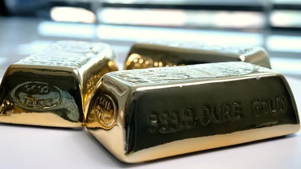 Rotating Gold Bars