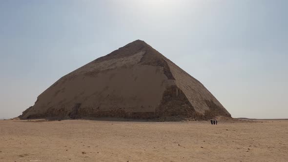 Wide Angle Shot Of Ancient Dahshur Bent Pyramid In Egypt. Heat In Desert.