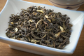 Dried Chinese Jasmine tea leaves close up in a bowl - PhotoDune Item for Sale