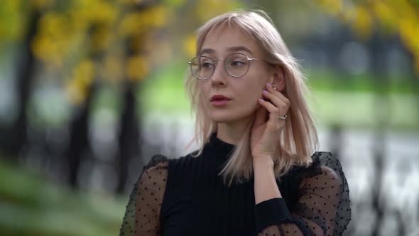 Portrait of Cute Blonde Woman Outdoors in Park, Charming Smiling Townswoman