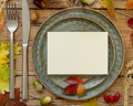 Autumn rustic table setting with blank card between leaves and berries top view, mockup - PhotoDune Item for Sale