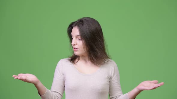 Young Beautiful Woman Catching Something