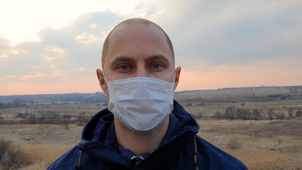Face of a man in medical mask.