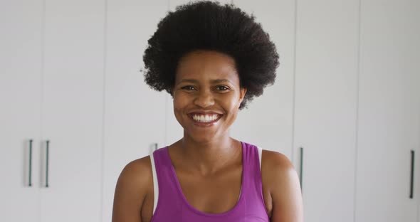 Portrait of happy african american woman looking at camera and smiling