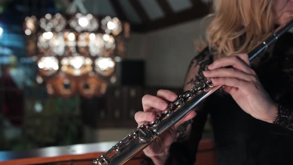 Woman Playing Flute in Church