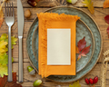 Autumn rustic table setting with place card and envelope between leaves and berries top view, mockup - PhotoDune Item for Sale