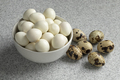 Cooked and raw Quail eggs close up - PhotoDune Item for Sale