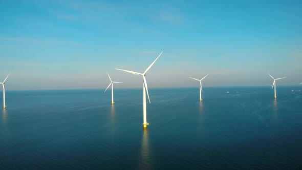 Windmill Park in the Ocean Drone Aerial View of Windmill Turbines Generating Green Energy Electric