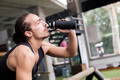 athlete drinking water while resting from workout - PhotoDune Item for Sale