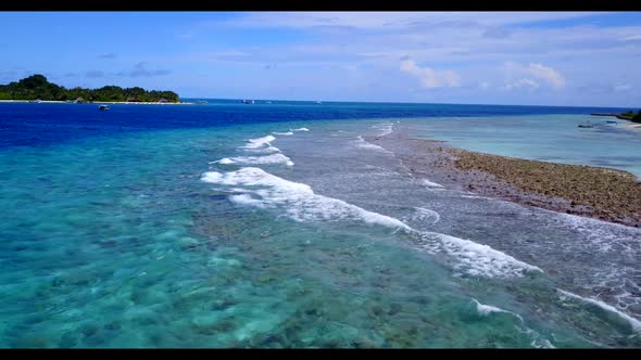 Aerial drone view seascape of relaxing lagoon beach voyage by clear water with white sand background