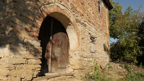 Serbian old stone building slow tilt 4K 2160p 30fps UltraHD footage - Ancient wine cellar details 38