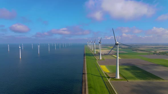 Wind Turbines in the Early Morning Wind Mill Park in the Netherlands