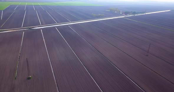 Freshly Worked Fields with Water Channels on the Sides