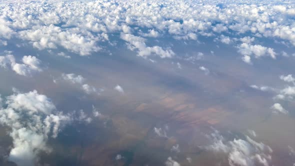 Clouds From The Airplane Window