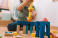 colorful wooden building blocks with child playing - PhotoDune Item for Sale