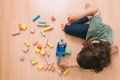 girl playing on the floor with building blocks - PhotoDune Item for Sale