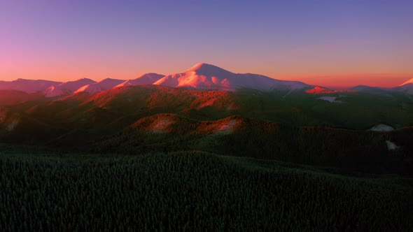 Aerial Winter view on Hoverla, peak of highest mountain of Ukraine. Winter Forest Snow 