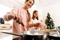 White mother and daughter cooking together in kitchen - PhotoDune Item for Sale