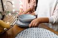 White mother and daughter washing dishes together in kitchen - PhotoDune Item for Sale