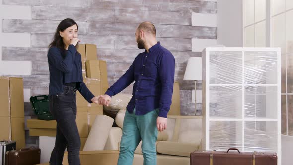 Caucasian Couple Excited About Their New Apartment