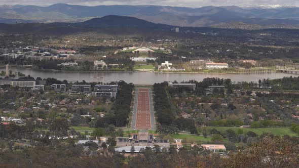 zoom in shot of canberra from mt ainslie lookout