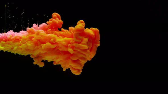 Super Slowmotion Shot of Color Inks in Water