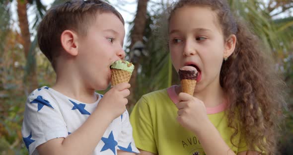 Portrait Cheerful Kids Smiling Children Happy Baby Boy and Little Girl Eating Ice Cream