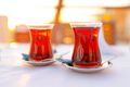 Two glasses with Turkish tea on white table - PhotoDune Item for Sale