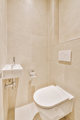 Narrow toilet room with minimalist design - PhotoDune Item for Sale