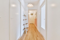 Narrow corridor with doors and lamp - PhotoDune Item for Sale