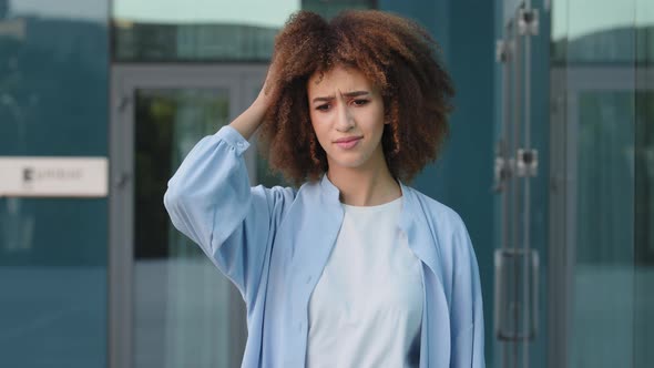 Pensive Pondering African American Woman Ethnic Mixed Race Girl with Curly Hair Scratch Head