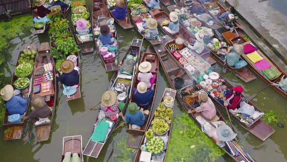 Damnoen Saduak Floating Market or Amphawa. Local people sell fruits, traditional food on boats