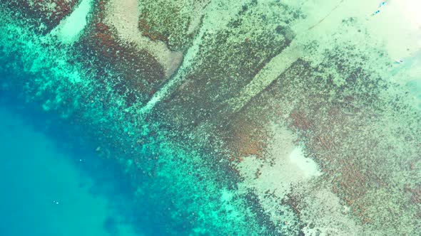 Aerial drone view abstract of beautiful bay beach holiday by blue green water with white sand backgr