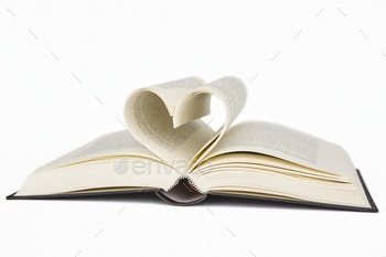 Open book with heart shaped pages. Love for reading