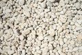 Naturally polished white rock pebbles background - PhotoDune Item for Sale