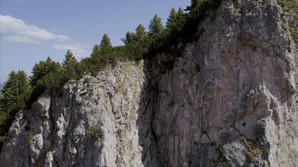 Panning and Lowering Close Up of Rugged Rugova Mountains of Kosovo