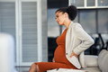 Pregnant african business woman suffering backache - PhotoDune Item for Sale