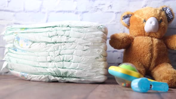 Stack of Baby Diaper on Table