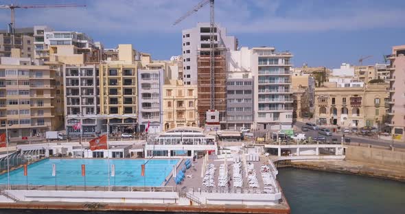 Spinola Bay with Traditional maltese Luzzu