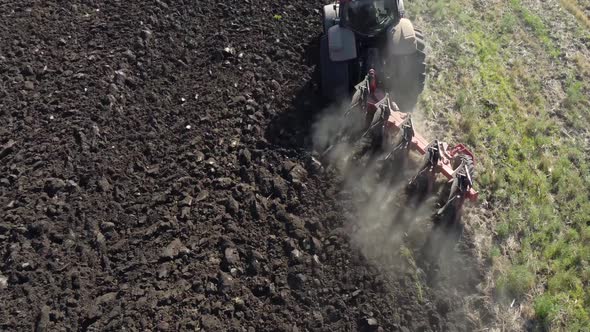 Top View of Plowed Land From a Plow Plowing a Tractor in a Field