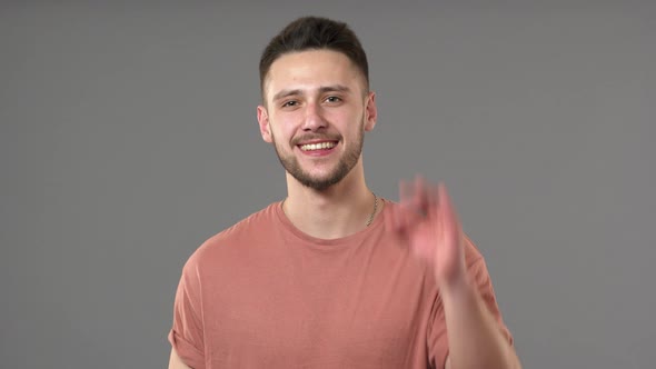 Portrait of Happy European Man Showing Ok Symbol Meaning Good Successful Result or Choice Isolated