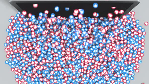 Like and Heart Icons Fall Down From the Laptop Screen alt