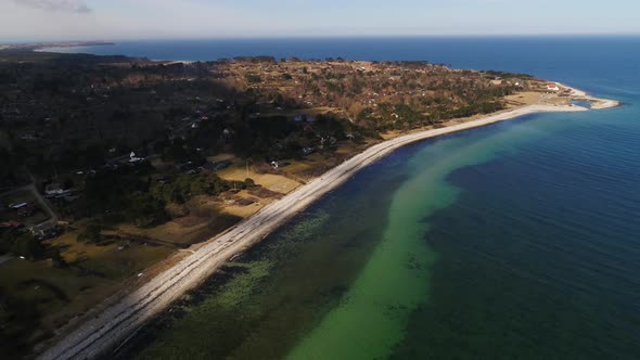 Flying Over Calm Sea And Summer House Area, Drone Stock Footage By Drone Rune 2 1