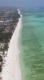 Vertical Video Boats in the Ocean Near the Coast of Zanzibar Tanzania