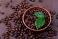 Close up of roasted coffee beans and leaves - PhotoDune Item for Sale