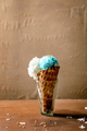 Turquoise ice cream in waffle cone - PhotoDune Item for Sale